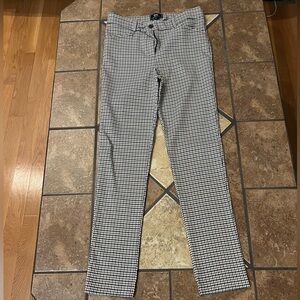 Plaid brown, black, and white HAVE dress pants size Medium.